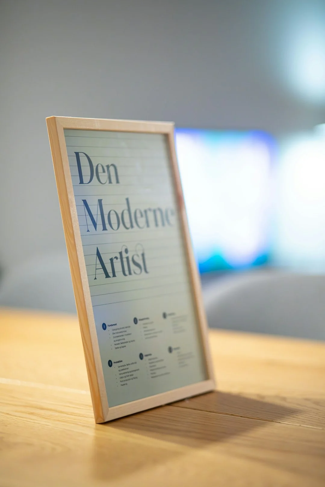Dual monitors on a desk, showcasing web design in a modern office setting.